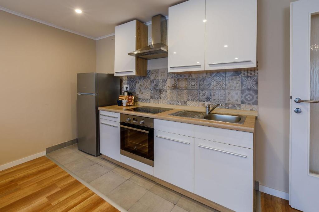 Kuchyňa alebo kuchynka v ubytovaní Apartment Edmond