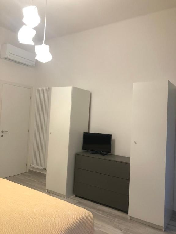 Łóżko lub łóżka w pokoju w obiekcie Casa Vincenzina