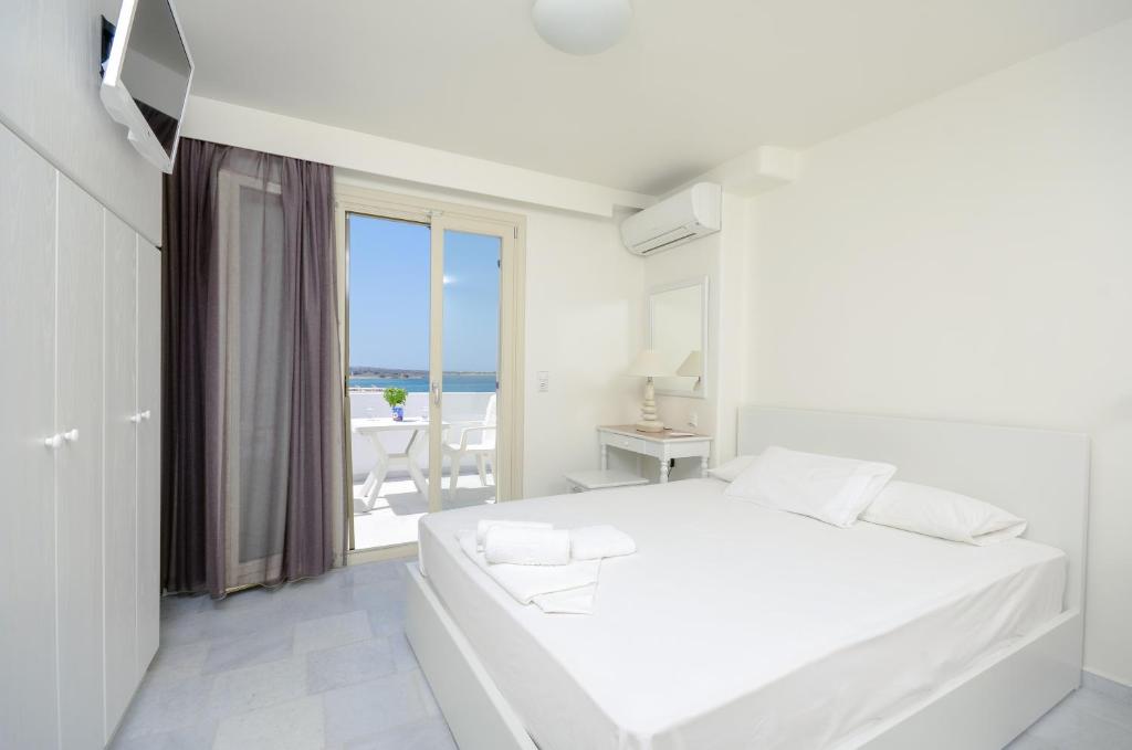 A bed or beds in a room at Soula Naxos