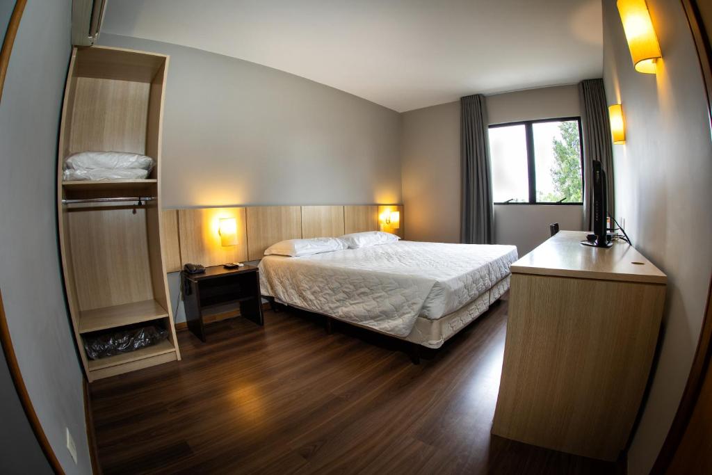 Postel nebo postele na pokoji v ubytování Hotel Campo Largo Express