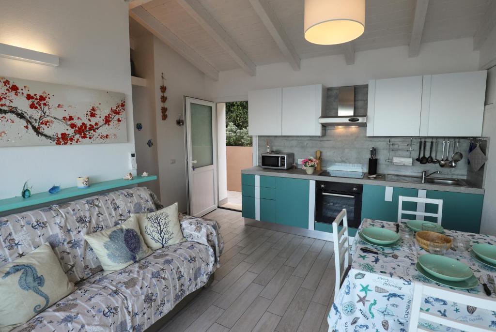 A kitchen or kitchenette at Barbara's house - Sardinia