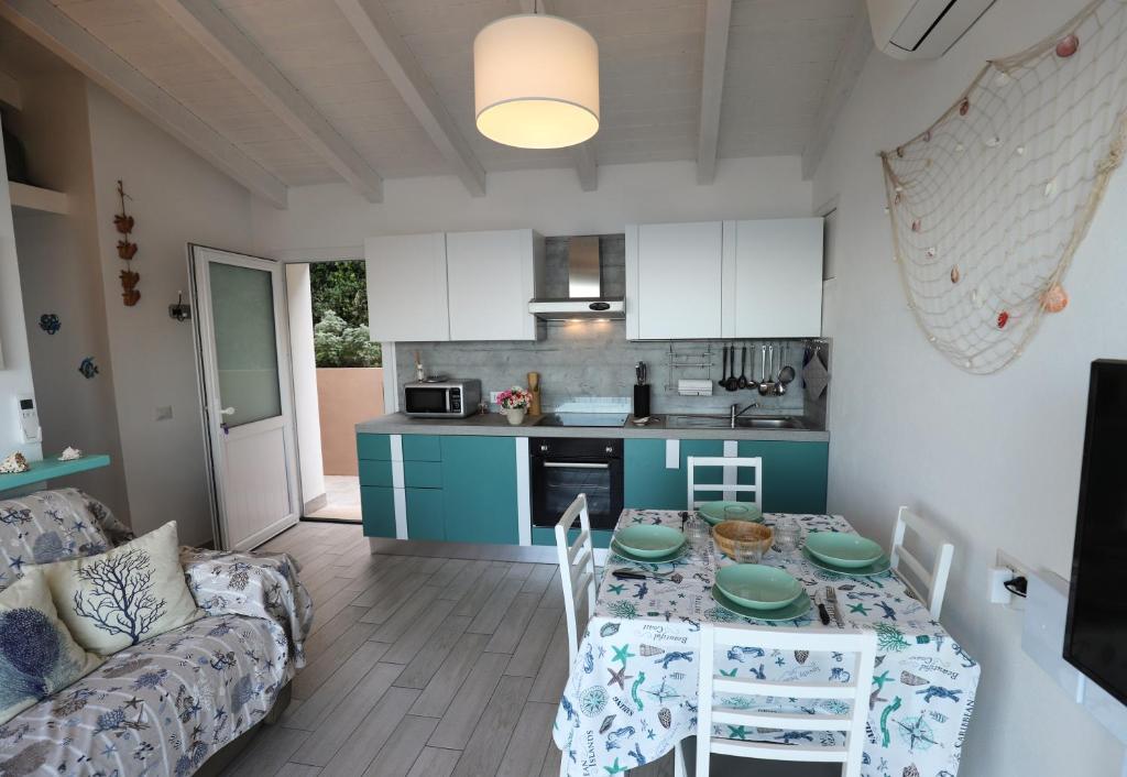 A kitchen or kitchenette at Barbara's house - Sardinia