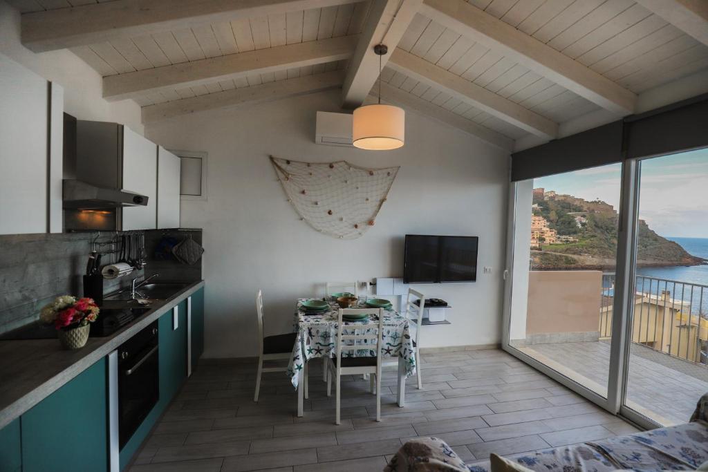 A kitchen or kitchenette at Barbara's house - Sardinia