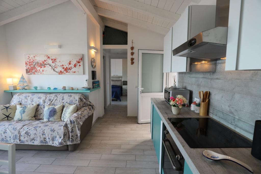 A kitchen or kitchenette at Barbara's house - Sardinia