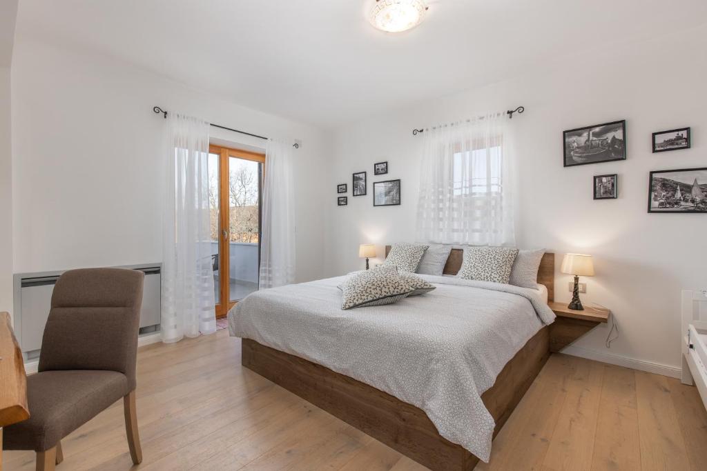 Postel nebo postele na pokoji v ubytování VILLA LAURA