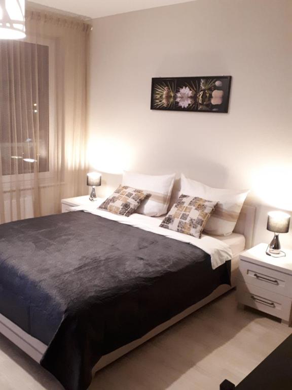 Postel nebo postele na pokoji v ubytování Vena apartment