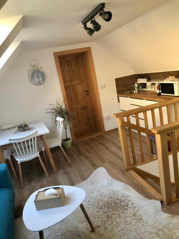Kuchyň nebo kuchyňský kout v ubytování Apartmán U Kapličky