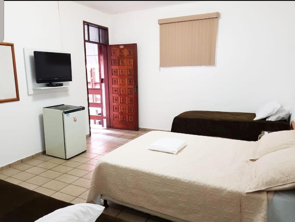 TV a/nebo společenská místnost v ubytování HOTEL POUSADA ALAGOINHAS