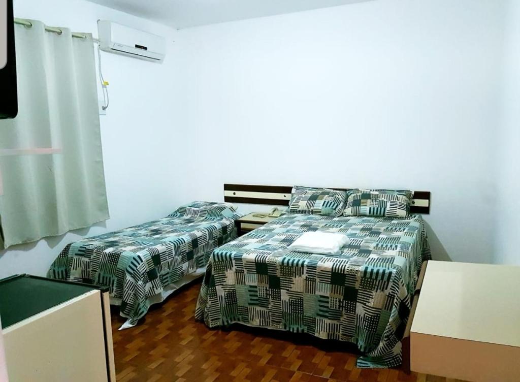 Postel nebo postele na pokoji v ubytování HOTEL POUSADA ALAGOINHAS