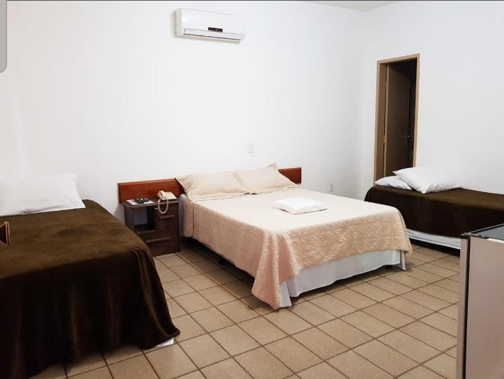 Postel nebo postele na pokoji v ubytování HOTEL POUSADA ALAGOINHAS