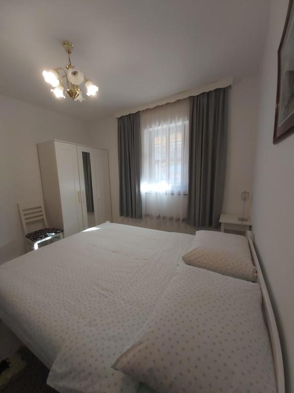 Postel nebo postele na pokoji v ubytování Apartment Mira