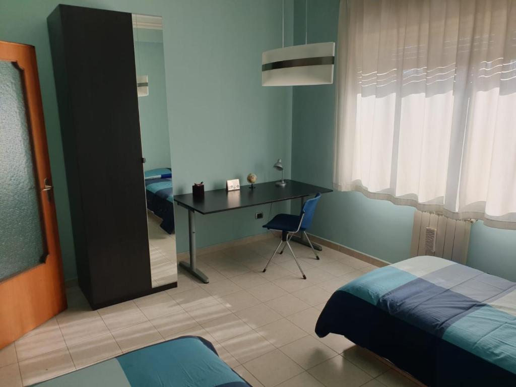Łóżko lub łóżka w pokoju w obiekcie COCO Apartments