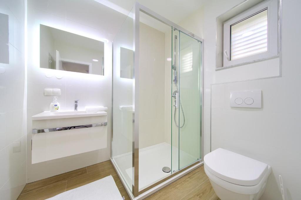 Koupelna v ubytování Adria House