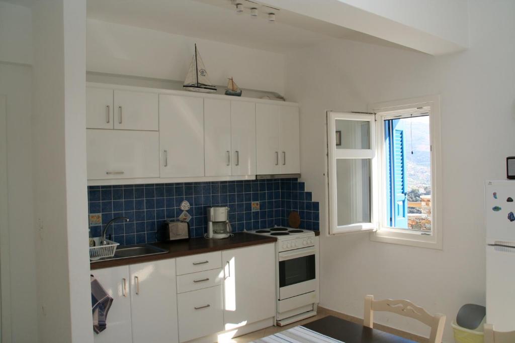 Kuchyň nebo kuchyňský kout v ubytování Villa Gabriela