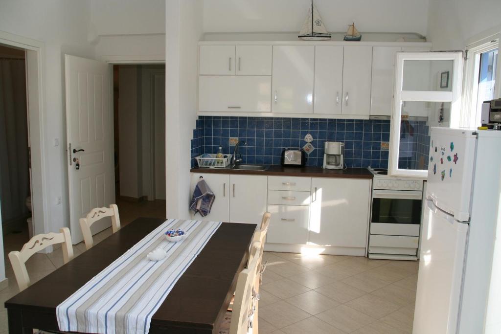 Kuchyň nebo kuchyňský kout v ubytování Villa Gabriela