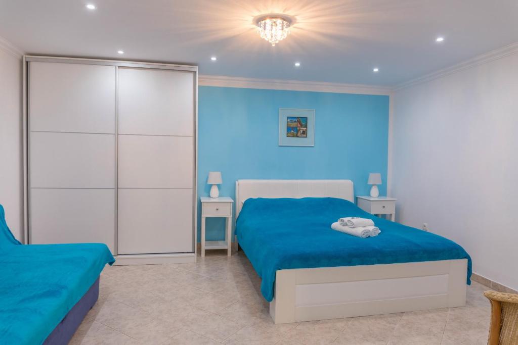 Postel nebo postele na pokoji v ubytování Guest House Sidro