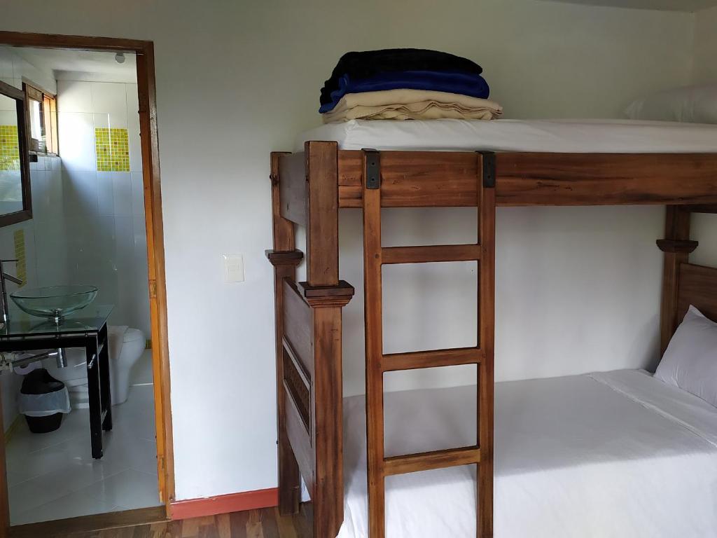 Postel nebo postele na pokoji v ubytování Hotel Zocalo Campestre