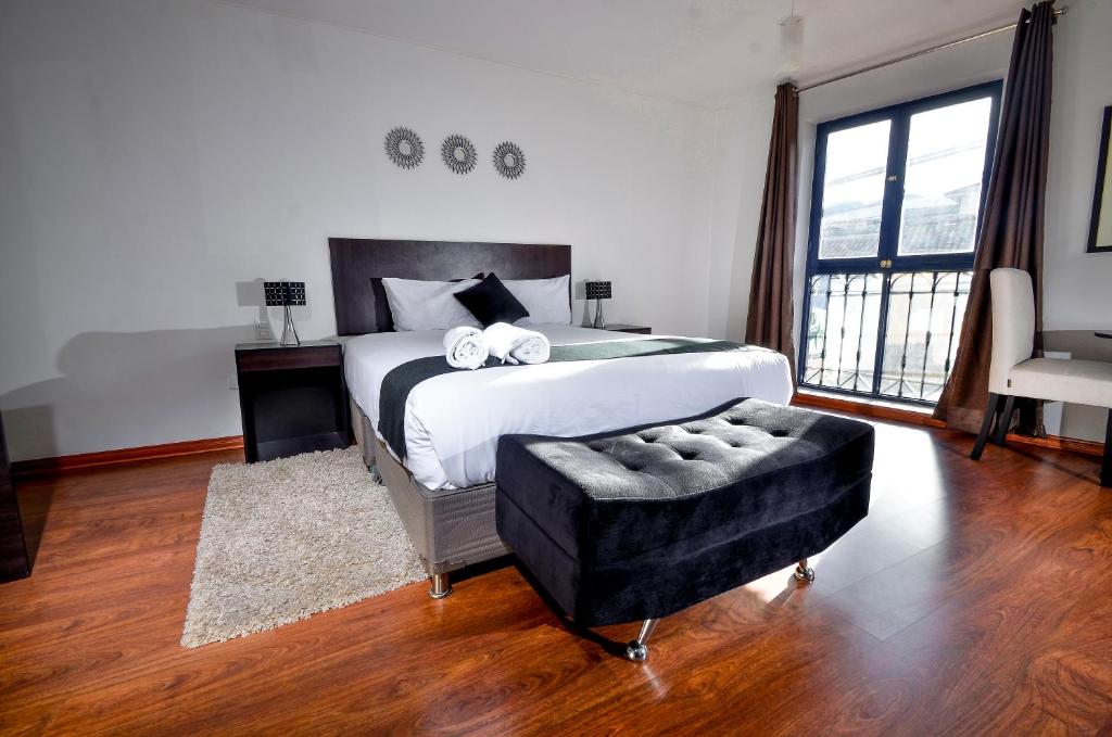 Postel nebo postele na pokoji v ubytování Ankawa Hotel Boutique