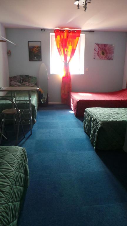 Postel nebo postele na pokoji v ubytování Hotel Le Gambetta