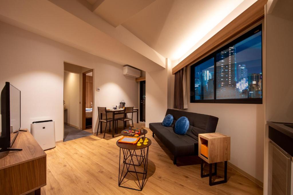 TV a/nebo společenská místnost v ubytování Popway Residence Tennoji