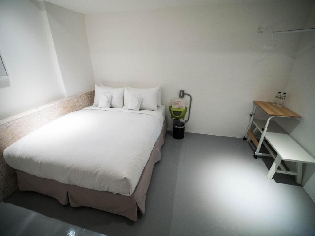 金屋旅棧房間的床