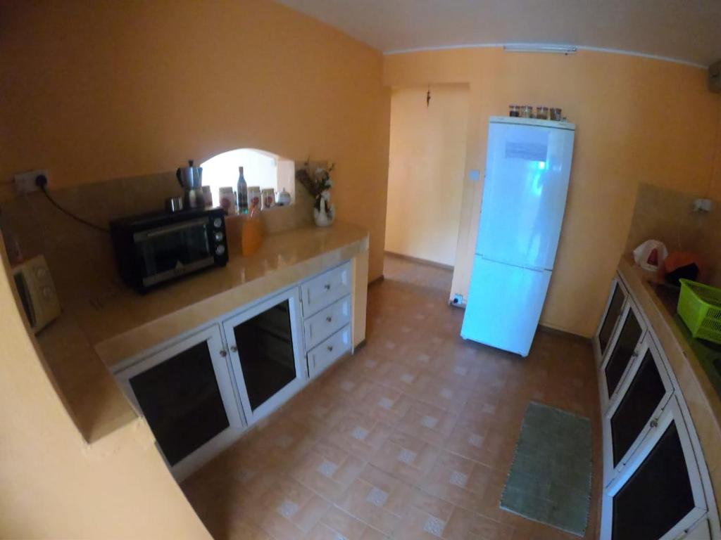 Kuchyň nebo kuchyňský kout v ubytování Apex Kite Appartment & Rooftop Garden