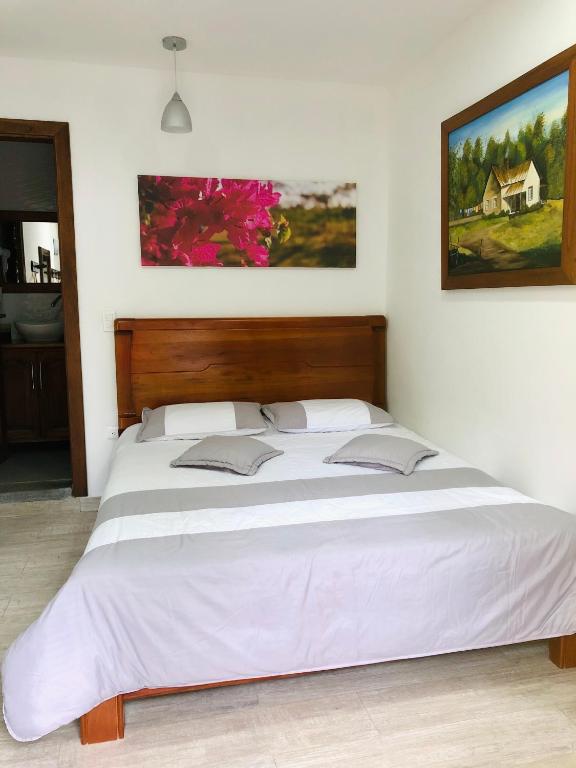 Postel nebo postele na pokoji v ubytování 40 Amigos Hotel