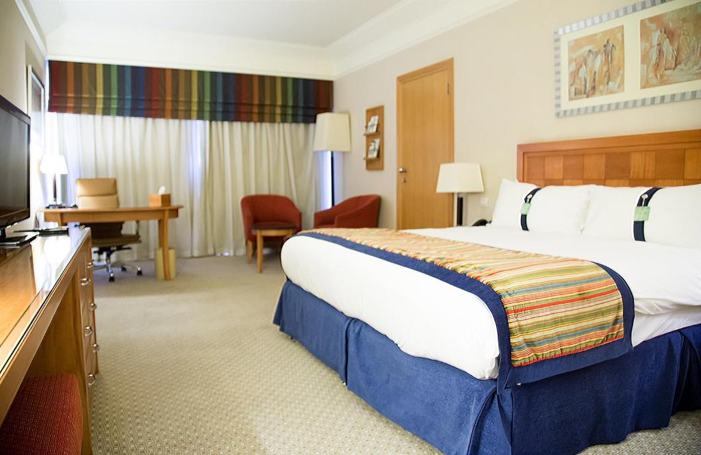 Postel nebo postele na pokoji v ubytování Holiday Inn Citystars by IHG