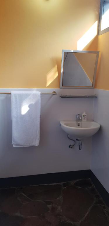 Koupelna v ubytování Dewi Sri Guesthouse