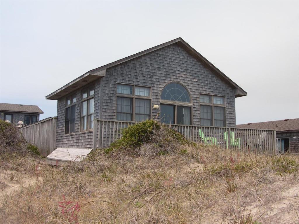 a house on the top of a hill at 40399 Beachcomber Rd Home in Avon