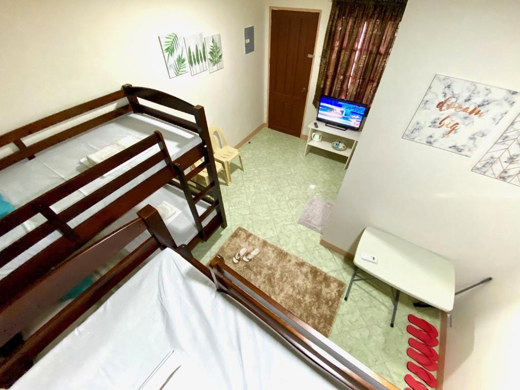 Postel nebo postele na pokoji v ubytování RQS Hostel