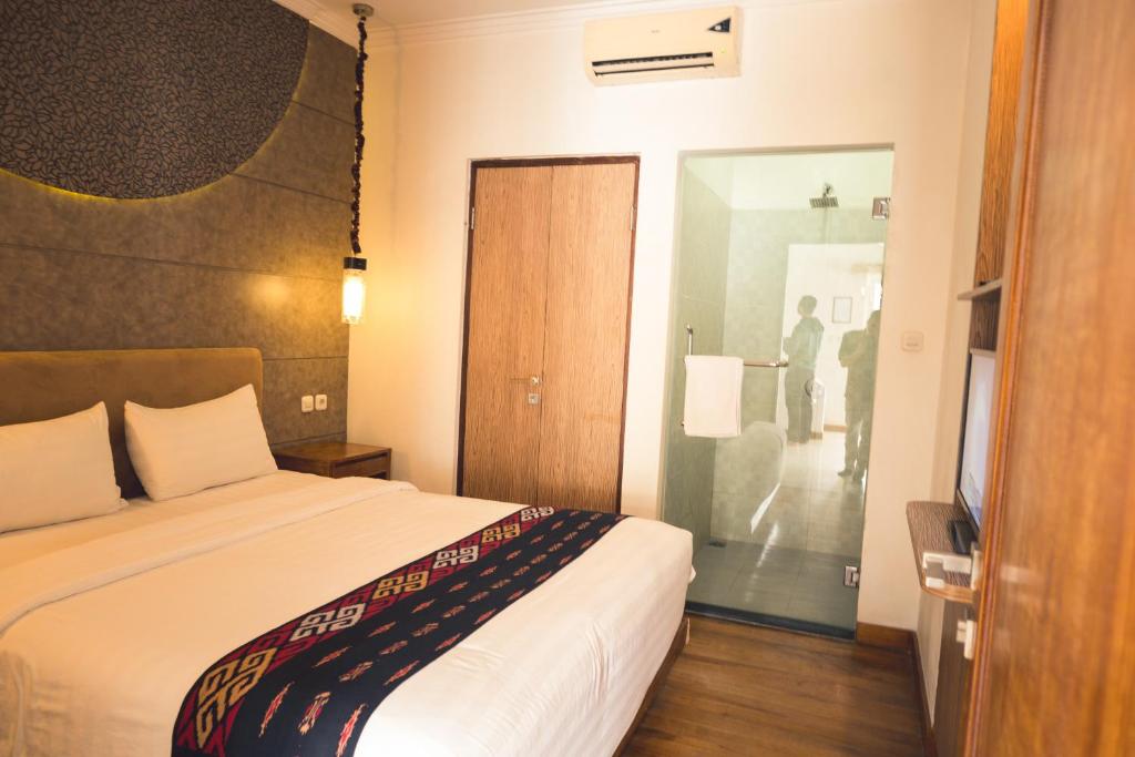 Letto o letti in una camera di Ocean View Residence