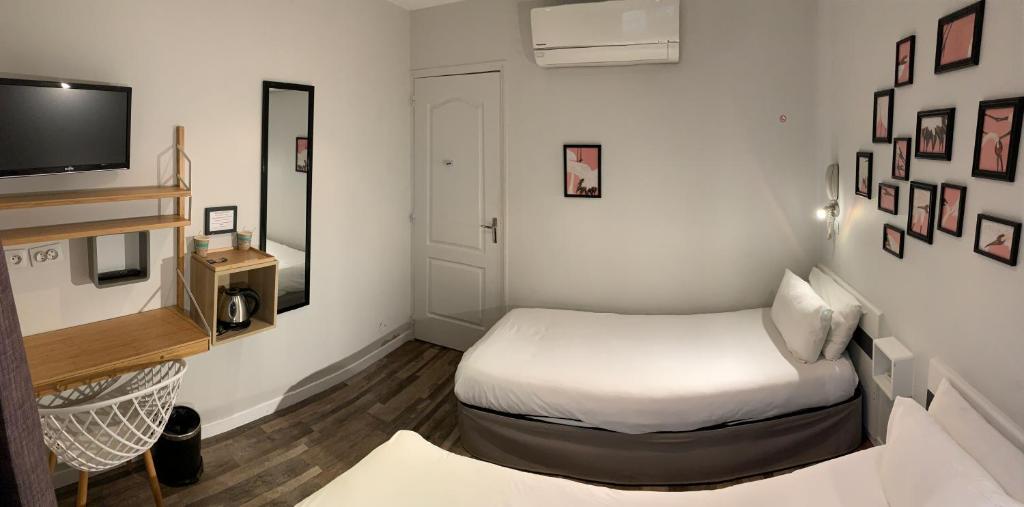TV a/nebo společenská místnost v ubytování Hotel de Berne