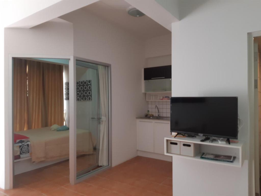 TV a/nebo společenská místnost v ubytování Avatara Condo B24 by malai