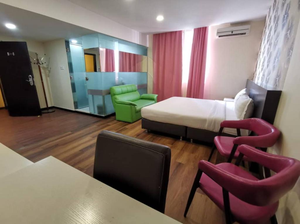 Postel nebo postele na pokoji v ubytování Prince Hotel
