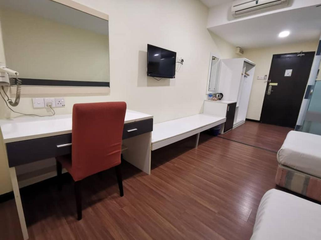 Postel nebo postele na pokoji v ubytování Prince Hotel