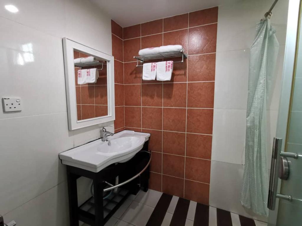 Koupelna v ubytování Prince Hotel