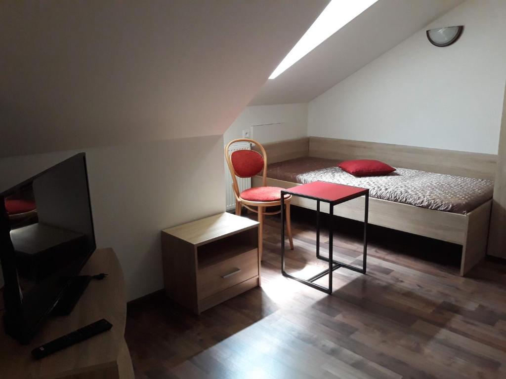 Postel nebo postele na pokoji v ubytování Penzion Fantasy - restaurant