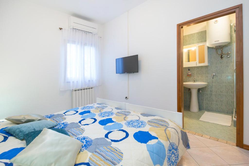 Łóżko lub łóżka w pokoju w obiekcie House Kontus