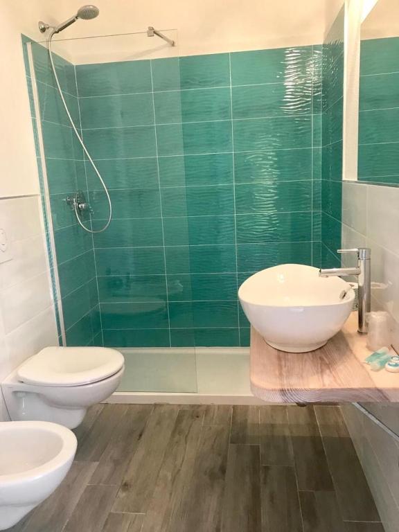 Koupelna v ubytování Hotel Sandalion