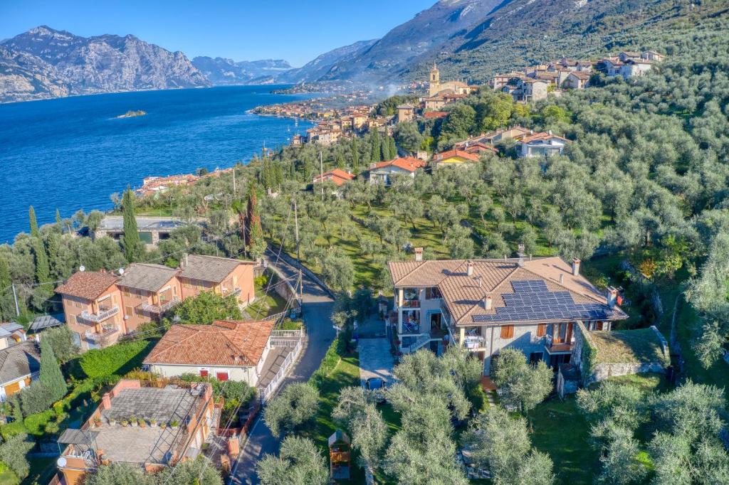 an aerial view of a house next to the water at Casa Maya in Brenzone sul Garda