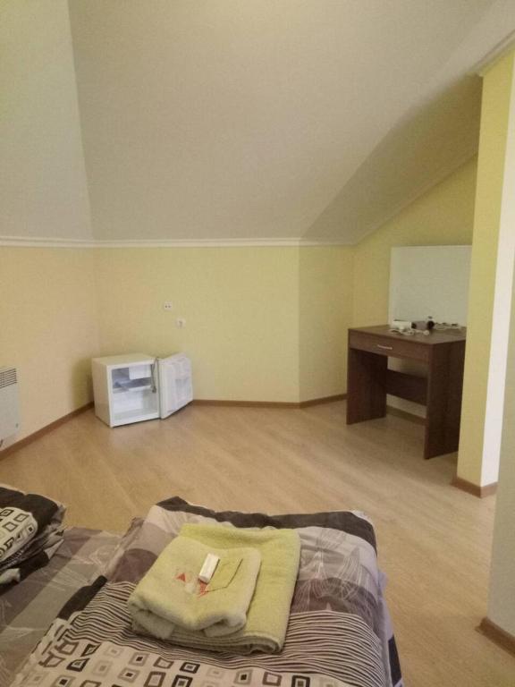 Postel nebo postele na pokoji v ubytování Згадка