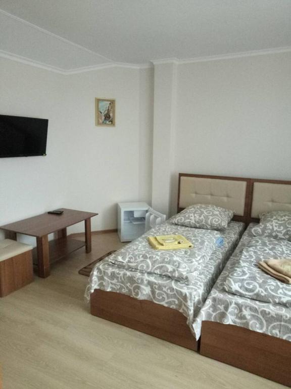 Postel nebo postele na pokoji v ubytování Згадка