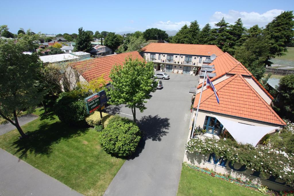 an overhead view of a building with a parking lot at Bush Inn Court Motel in Christchurch