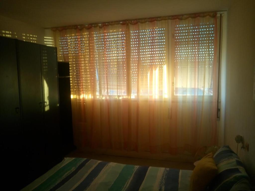Postel nebo postele na pokoji v ubytování APARTMENT SUNSHINE- center of Split