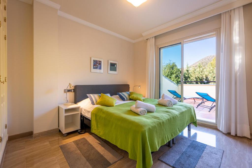 Postel nebo postele na pokoji v ubytování Sierra Blanca, Marbella