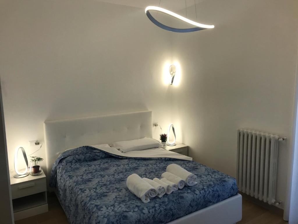 Postel nebo postele na pokoji v ubytování B&B Home Sweet Home - Affitti Brevi Italia