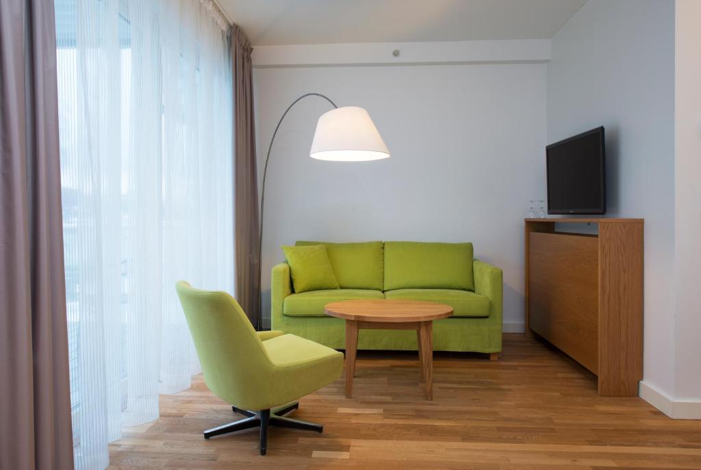 TV a/nebo společenská místnost v ubytování Thon Hotel Sandven