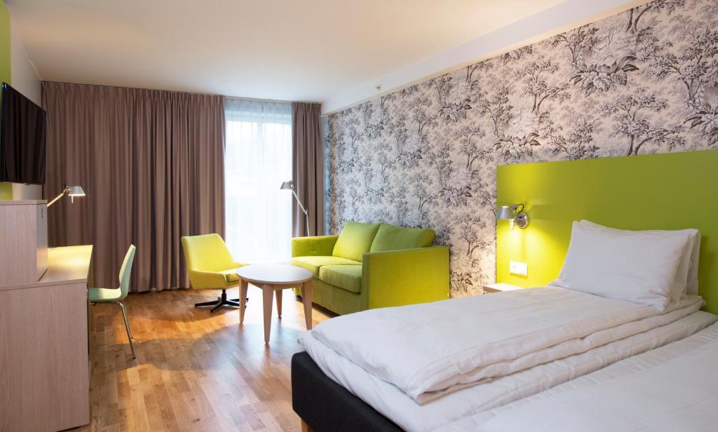 Postel nebo postele na pokoji v ubytování Thon Hotel Sandven