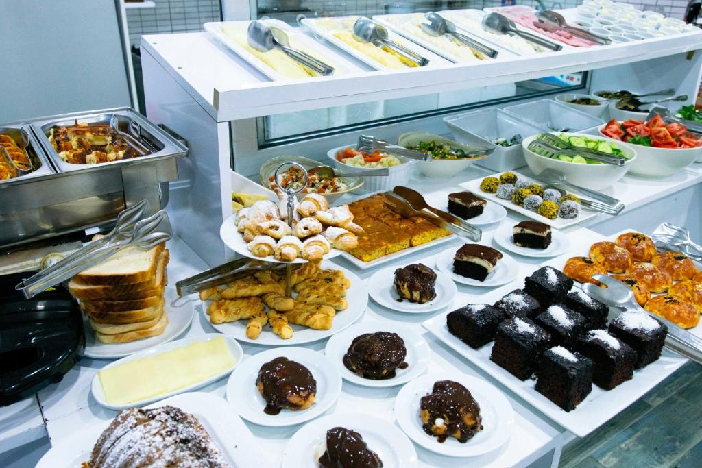 a buffet filled with lots of different types of food at Infinity City Hotel in Fethiye